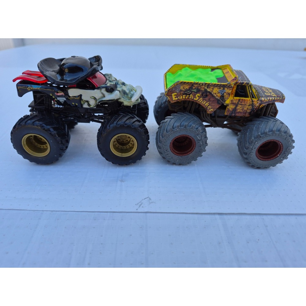 Monster Jam Pirates Curse and Zombie vs Hunter Earth Shaker Die-Cast Truck Lot